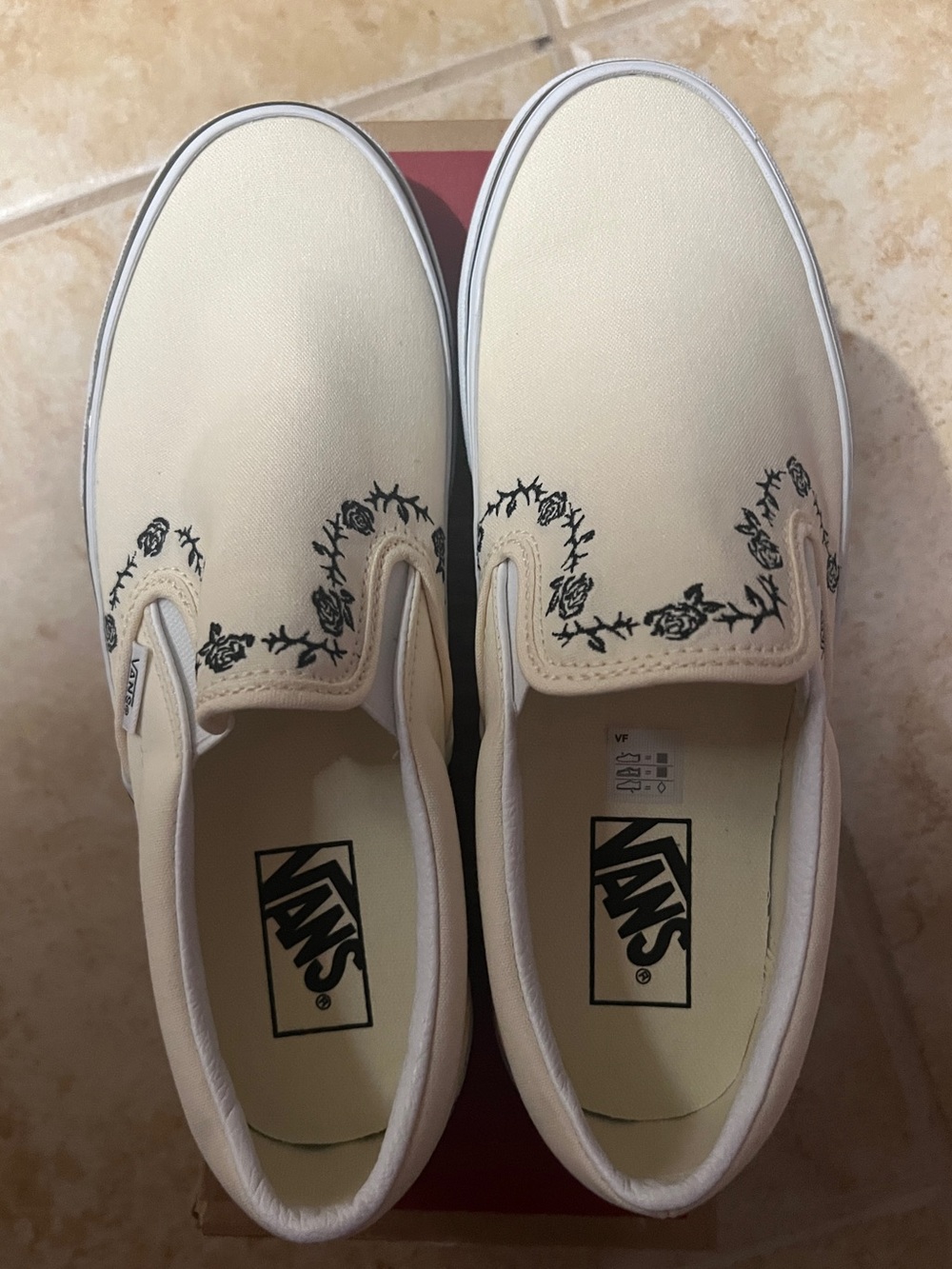 Vans Women’s Cream Slip-On Sneakers with Rose Vine Embroidery